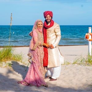 This beautiful wedding out fit I got maid in Pakistan. only worn twice.